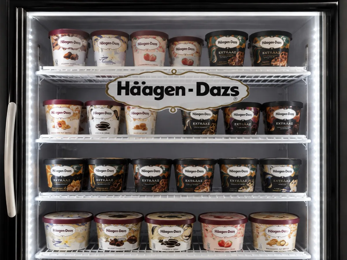 Ice cream freezer stocked with Häagen-Dazs tubs