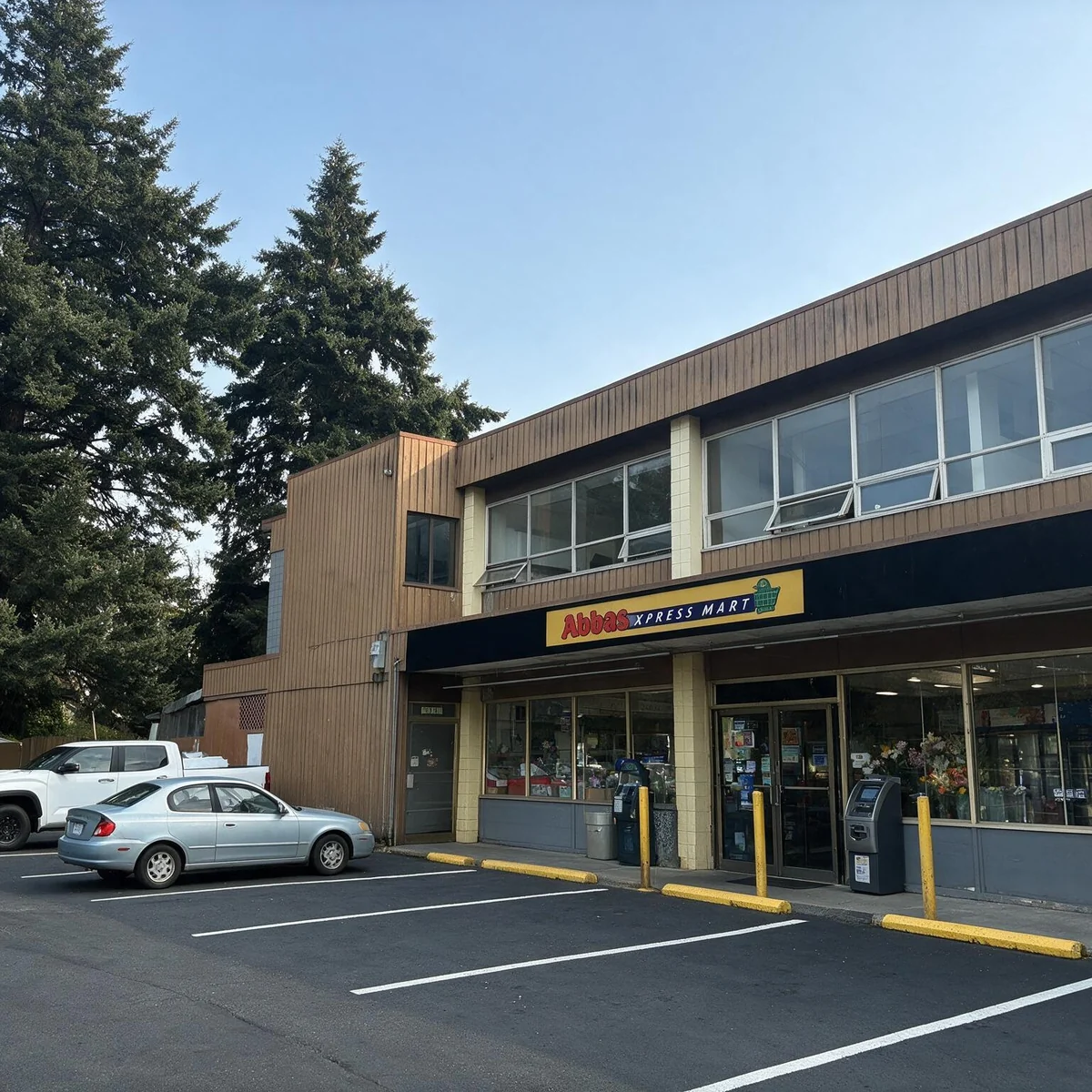 The plaza and parking lot outside the store